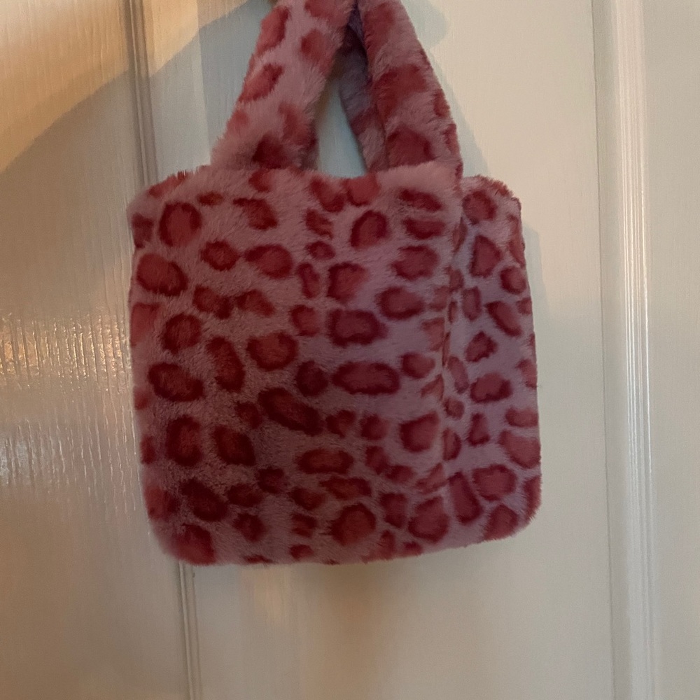 pink cheetah print fuzzy bag